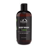 Bottle of Mountaineer Brand Products men's body wash labeled "tundra" with lime, sage, and bergamot scents, 12 fl oz or 355 ml.