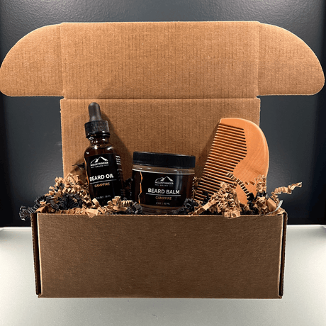 A LIMITED EDITION Campfire Combo box containing a comb, beard oil, and a bottle of beard oil.